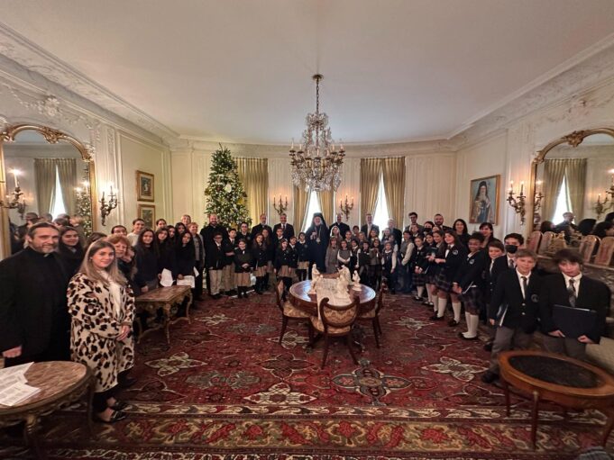 Greek-American Day School students sing carols to the Archbishop