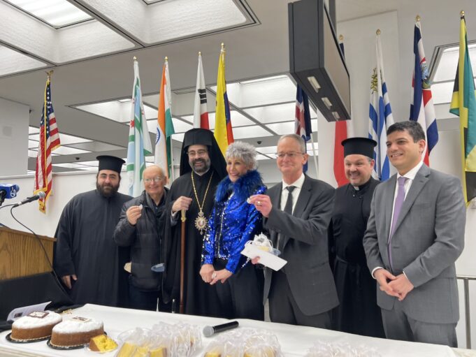 Metropolitan Nathanael joins public officials in cutting of the Vasilopita celebration
