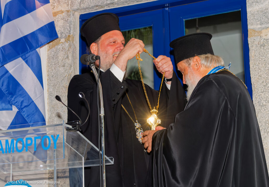 Amorgos, July 19th, 2026 His Beatitude Pope and Patriarch of Alexandria and All Africa THEODOROS II arrived in Amorgos Island to Honor Fr. Thomas Synodinos for his 40 years serving the church. Many Dignitaries were present to Honor Fr. Thomas in the square of Choria Amorgos. Nikos Gavalas and his family were very proud of their own Fr. Thomas. Minister of Culture Lina Mendoni, minister Kikilias, Metropolitans from Siros, Nea Ionia, and Thyra all Congratulated Fr. Synodinos for his accomplishments.